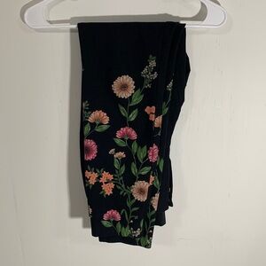 Alfani black slacks with floral bottom half, good condition button & slide clasp